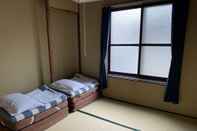 Bedroom Matsue Guest House - Hostel