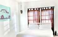 Kamar Tidur 4 Orange Tree Cottages Downtown