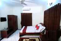 Bedroom Novem Inn & Holidays