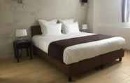 Kamar Tidur 4 Hotel Le Dome