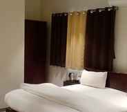 Bedroom 6 Hotel Marigold Mount Abu with Swimming Pool