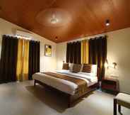 Bedroom 3 Hotel Marigold Mount Abu with Swimming Pool