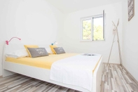 Kamar Tidur Sunny Apartments