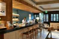 Bar, Cafe and Lounge Blossom Hill Inn · Shantang