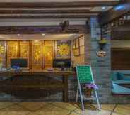 Lobby 5 Floral Hotel · He Lu Ju Lijiang