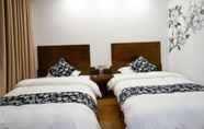 Bilik Tidur 3 Floral Hotel · Spring Guesthouse Zhangjiajie