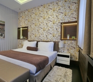 Bedroom 6 Belgreat Premium Suites