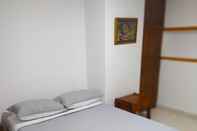 Kamar Tidur Hotel Cumanday