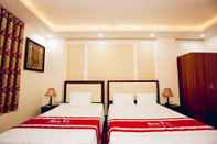 Kamar Tidur Teamo Hotel