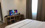 ห้องนอน 5 Bai Chuan Hotel