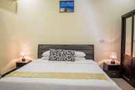 Kamar Tidur Charming Holiday Lodge