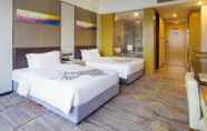 Kamar Tidur 4 Tianyuan Junlong Hotel