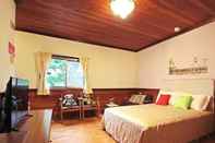 Phòng ngủ Hua Shan Hor Yuan Homestay