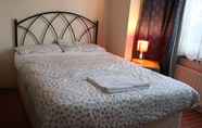 Bilik Tidur 4 Lenton Lodge Guest House