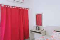 Bedroom Maness Guesthouse & Homestay