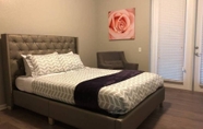 Bedroom 2 Tideview 66 · NEW Luxury 3 Suites Resort Home. Sleep 9