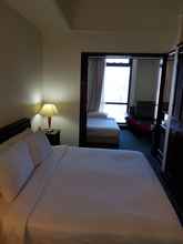 Kamar Tidur 4 Nice Service Suites At Times Square