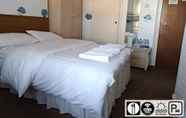 Kamar Tidur 3 Torland Seafront Hotel