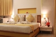 ห้องนอน Hotel Golden Leaf Resort