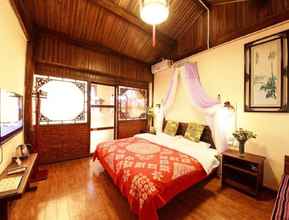 ห้องนอน 4 Lijiang shuimuxiquan Inn