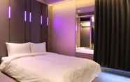 Bedroom 7 Kiwi Share Hotel - Zhongli Station Branch - Hostel