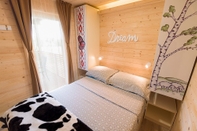 ห้องนอน Glamping Krone Kolpa Heaven