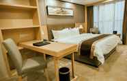 Bedroom 6 Days Inn by Wyndham Business Place Sichuan Bazhong