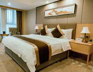 Bedroom 2 Days Inn by Wyndham Business Place Sichuan Bazhong