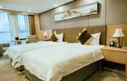 Bedroom 4 Days Inn by Wyndham Business Place Sichuan Bazhong