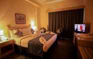 Kamar Tidur 4 Green House Hotel Apartments