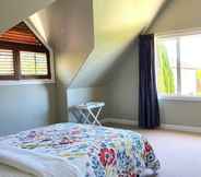 Bedroom 6 Castor Bay Home near Albany Sleeps 9