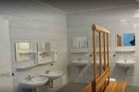 In-room Bathroom Wald- und Seeblick Camp