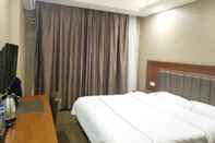 Bilik Tidur Huaxi Hotel