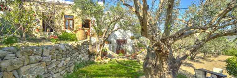 Exterior Picturesque Traditional Stone House