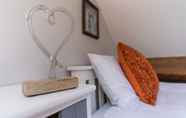 Bedroom 6 Stunning 2-bed Cottage in Fordwells