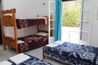 Kamar Tidur 4 The Purple Pig Stars Camping & Bungalows - Hostel