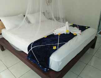 Kamar Tidur 2 Taman Menjangan Homestay