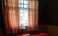 Kamar Tidur 2 Aminah Homestay and Tour