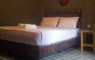 Kamar Tidur 4 Bamboo Homestay