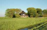 Exterior 3 Rural Holiday Home in the Frisian Workum With a Lovely Sunny Terrace