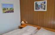 Kamar Tidur 4 Classy Holiday Home in Rzig near Forest