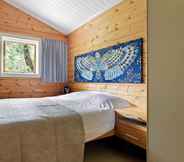 Bedroom 3 Finnish Chalet with Private Garden & Sauna near Veluwe