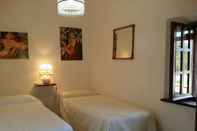 Kamar Tidur Lovely Holiday Home in Sasso Pisano With Swimming Pool