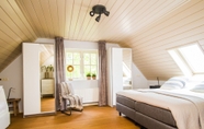 Bedroom 4 Beautiful Holiday Farm in Holten With hot tub and Sauna