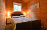 Bedroom 5 Luxurious Chalet in Guelders by the Forest