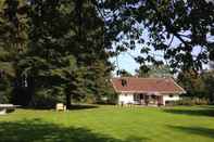 Exterior Detached House With Large Enclosed Garden, Playground Equipment and Covered Terrace