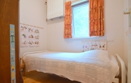 Bedroom 4 Detached House With Large Enclosed Garden, Playground Equipment and Covered Terrace