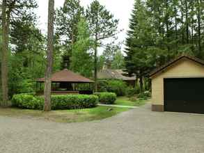 Exterior 4 Cosy Villa in the Middle of the Woods in Doornspijk