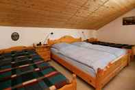 Bedroom Restful Holiday Home near Ski Lift in Petersthal