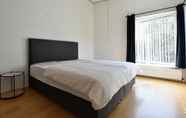 Bedroom 3 Luxury Holiday Home in the South of Limburg Province with Hot Tub, Sauna, Large Garden